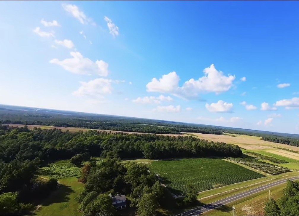 Aerial view of a farm at sunset
